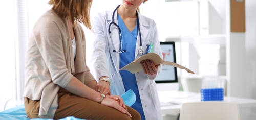 Doctor explaining uterine fibroids to a concerned patient