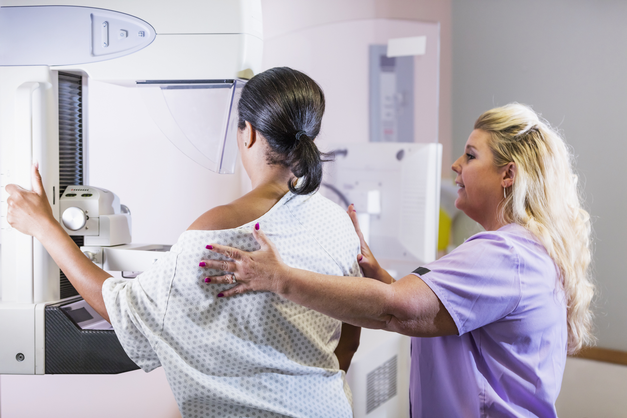 Woman getting mammogram exam at hospital