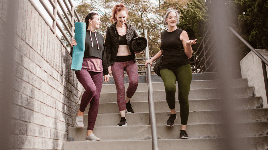 Three women exercising to lessen symptoms of living with PCOS
