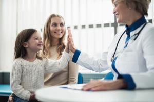 Mother and her daughter consulting pediatric endocrinologist
