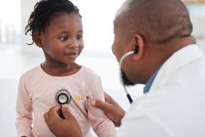 pediatrician and child heart doctor with a patient at hospital