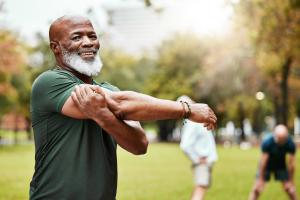 man stretching outdoors