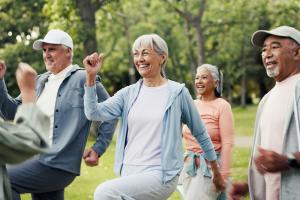 group of people exercising outdoors