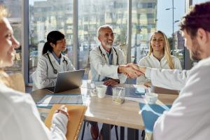 Healthcare practice leadership team collaboration meeting